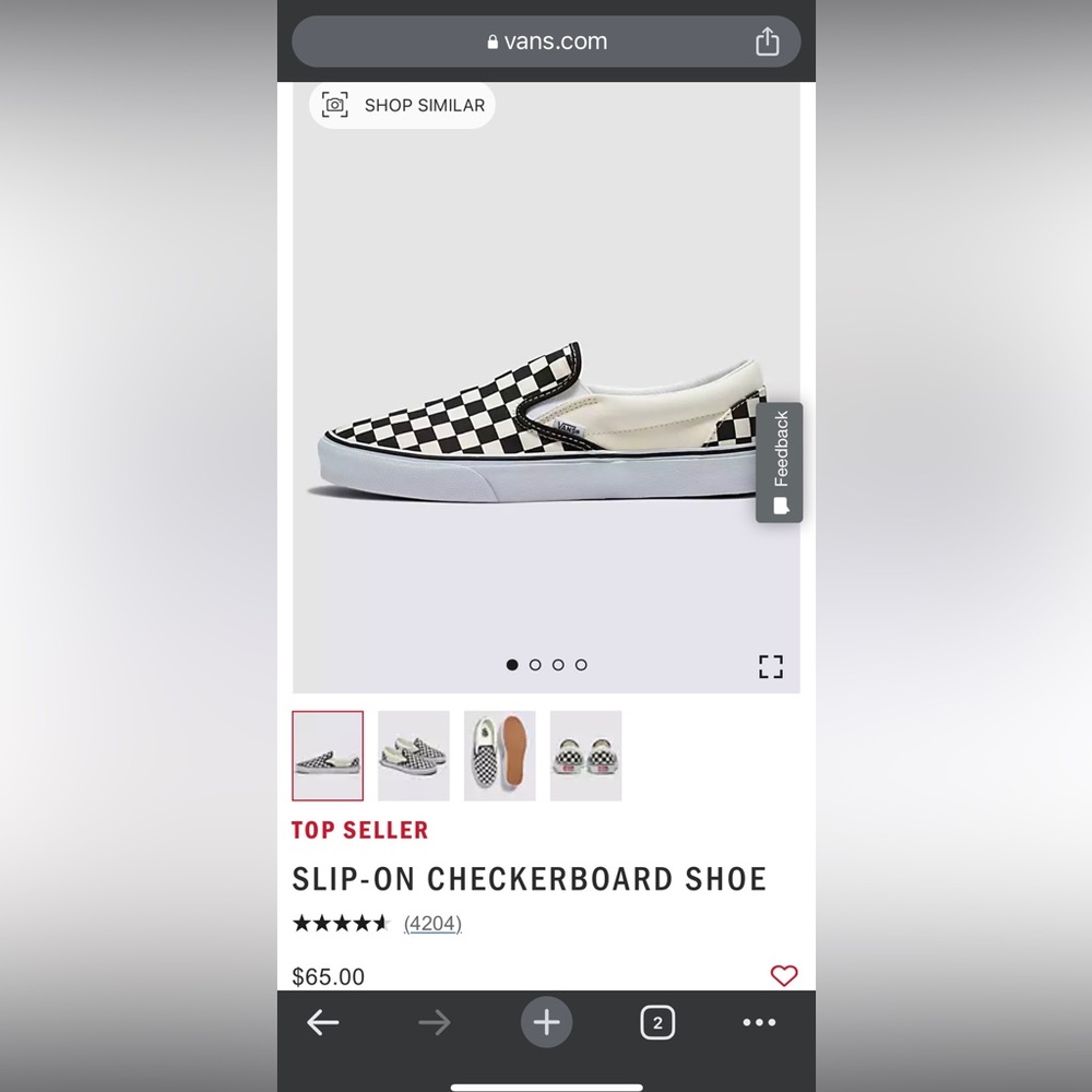 Vans slip-on checkerboard shoe. Classic black/off-white. Women’s Size 9.